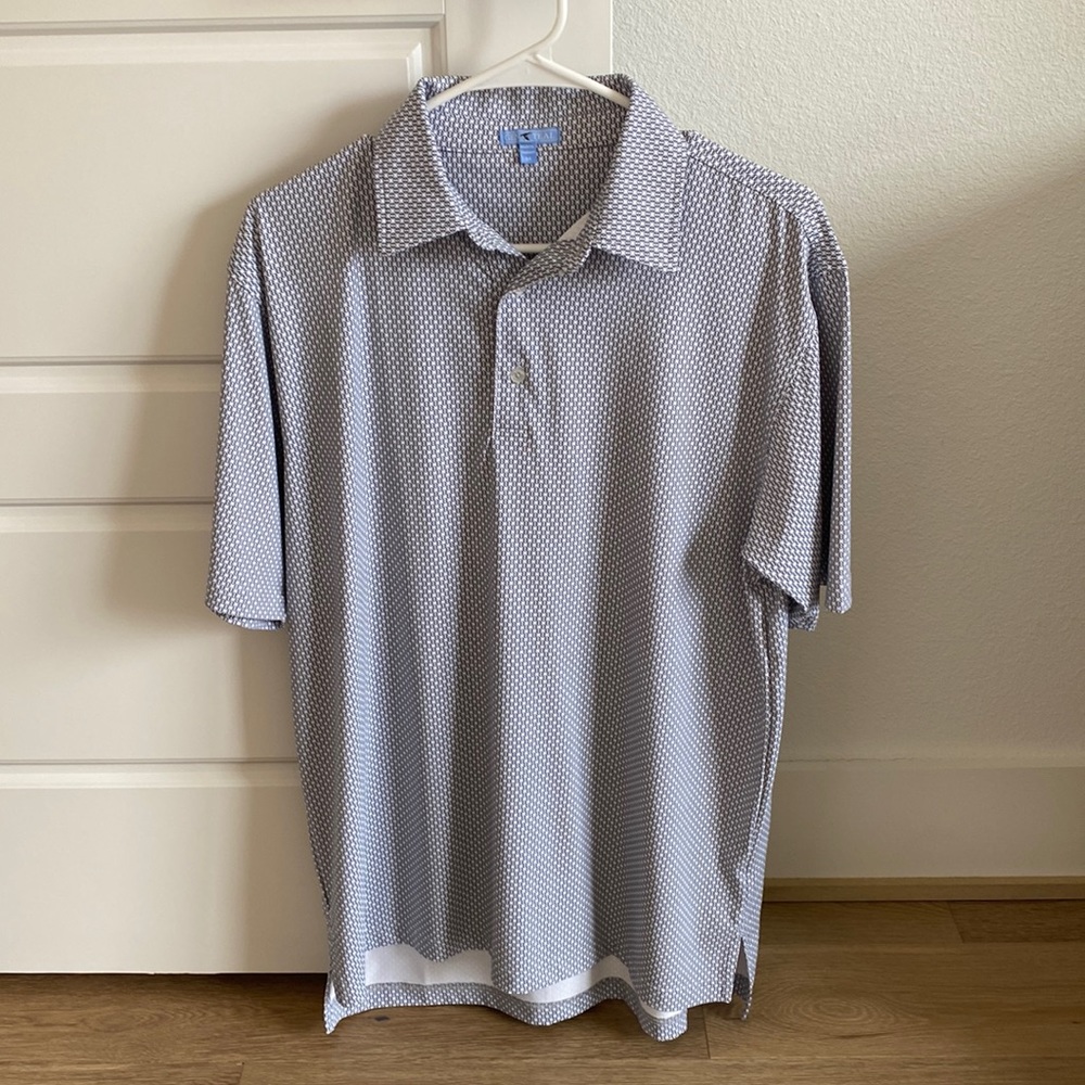 GenTeal performance polo. Baseball print, white and black color